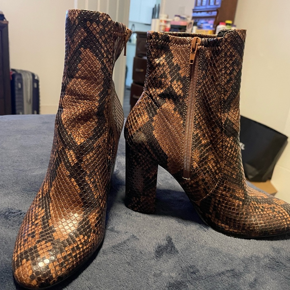 Faux snake skin ankle boots.  Side zipper.  3 in heel